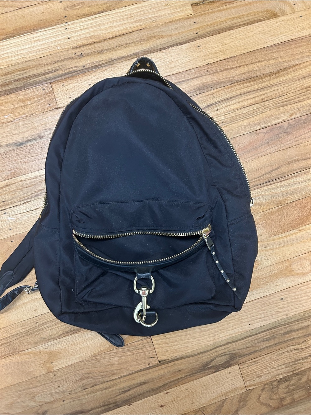 Rebecca Minkoff Black Backpack with Gold Hardware and Front Clasp